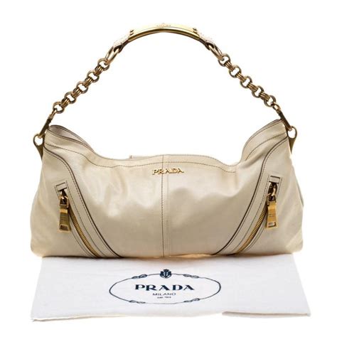 prada beige white clutch|prada purses for sale.